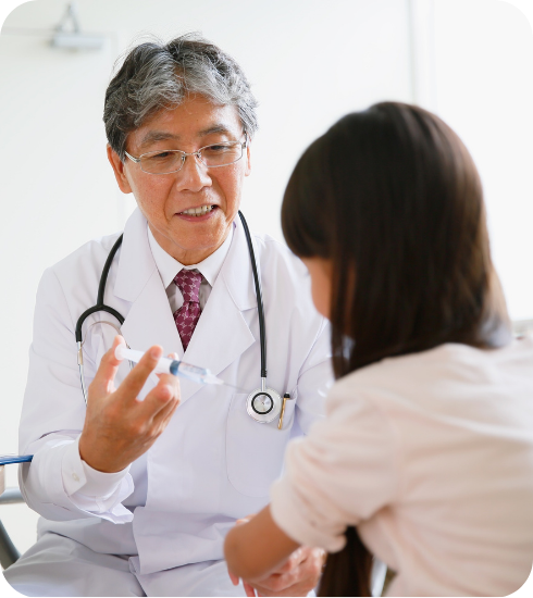 医療チームの連携、情報共有を行う医師と看護師